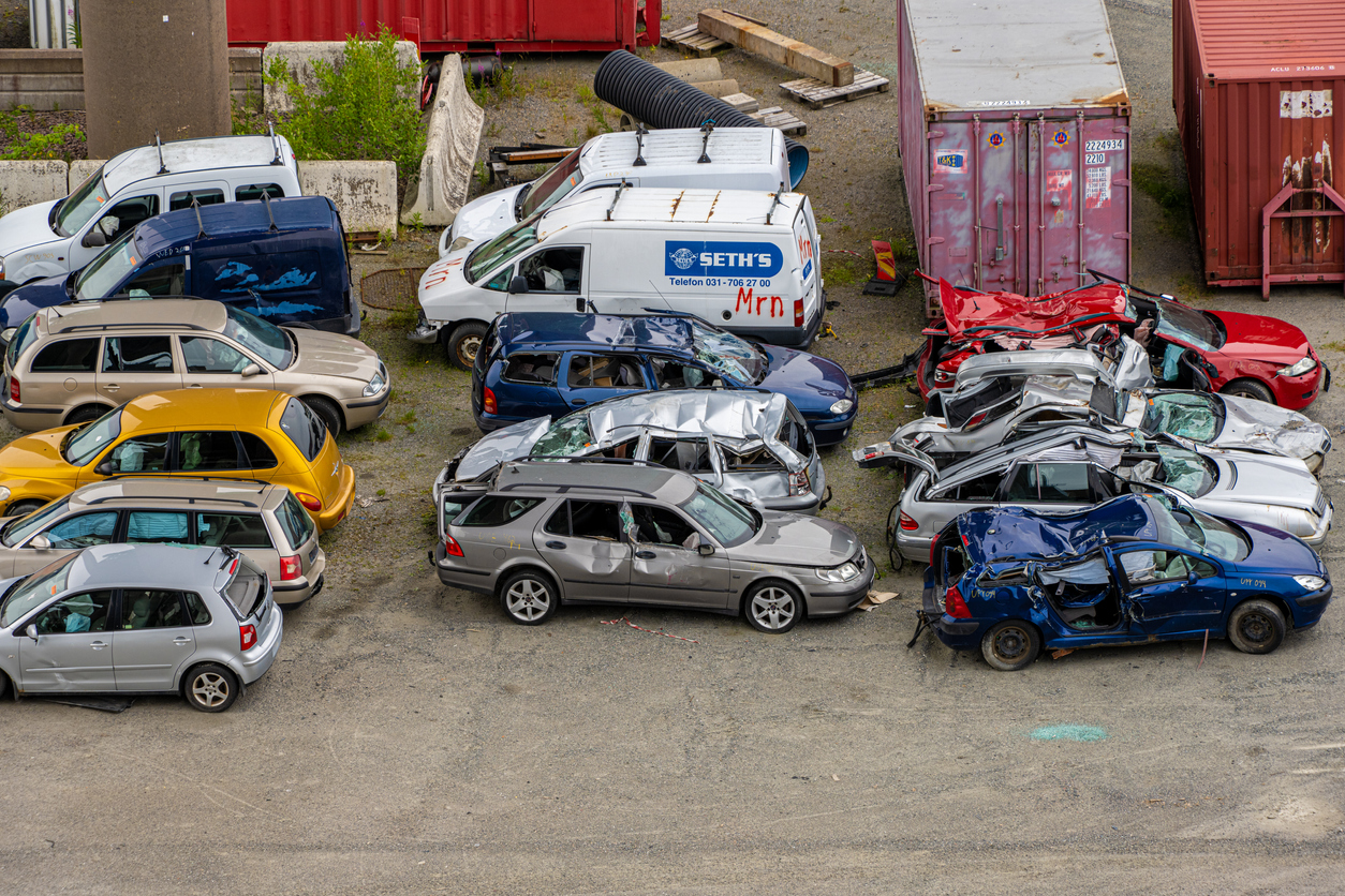 Various cars in a junkyard